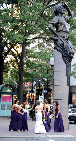 The girls at the corner of Trade and Tryon.